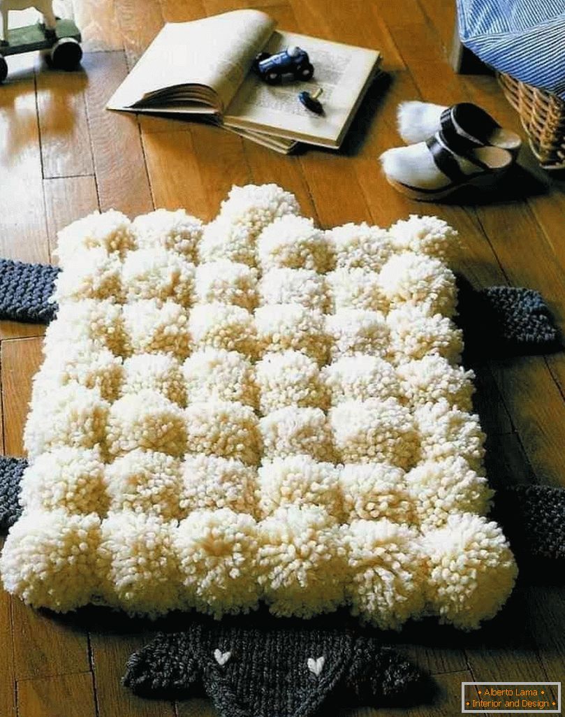 Teppich aus Pompons