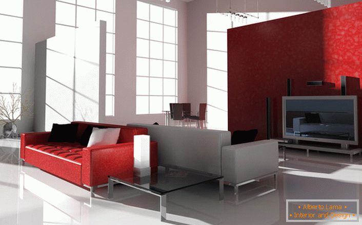 Die kontrastierende scharlachrote Farbe im High-Tech-Stil ist interessant und gefragt. Das helle rote Sofa auf den Chrombeinen ist ideal für die Dekoration eines modernen Interieurs.