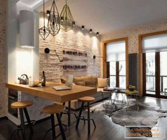 Design-Studio-Apartment mit Ziegelmauer