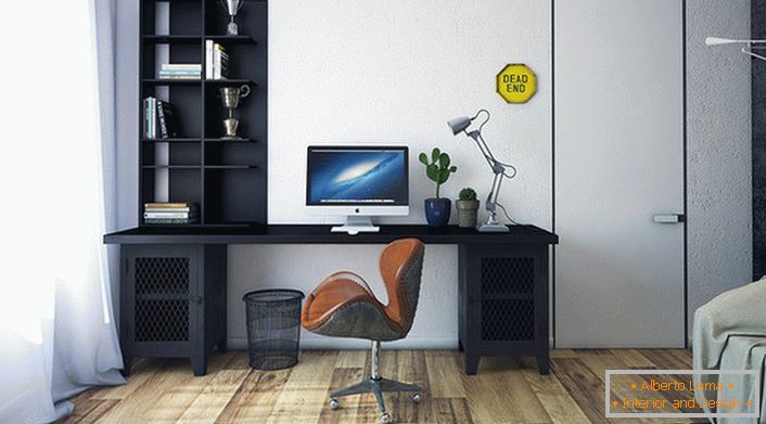 Für den Loft-Stil sind die Möbel richtig gewählt. Das dunkle Set kontrastiert mit einem hellen Finish und einem hellbraunen Boden. 