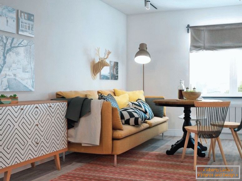 Wohnzimmer-in-Weiß-Farbe-mit-Sofa-und-Runde-Tisch