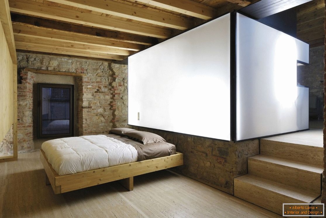 Schlafzimmer in einem Holzhaus in Brescia