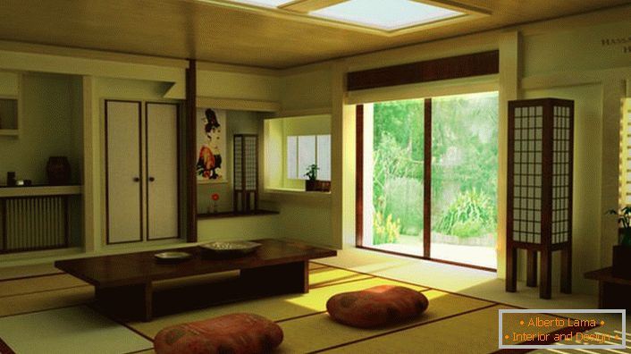 Über die Präsenz des japanischen Minimalismus im Wohnzimmer eines Landhauses erzählt die richtige Einrichtung. Ein niedriger Tisch ist ideal für zuhause Tee trinken. 