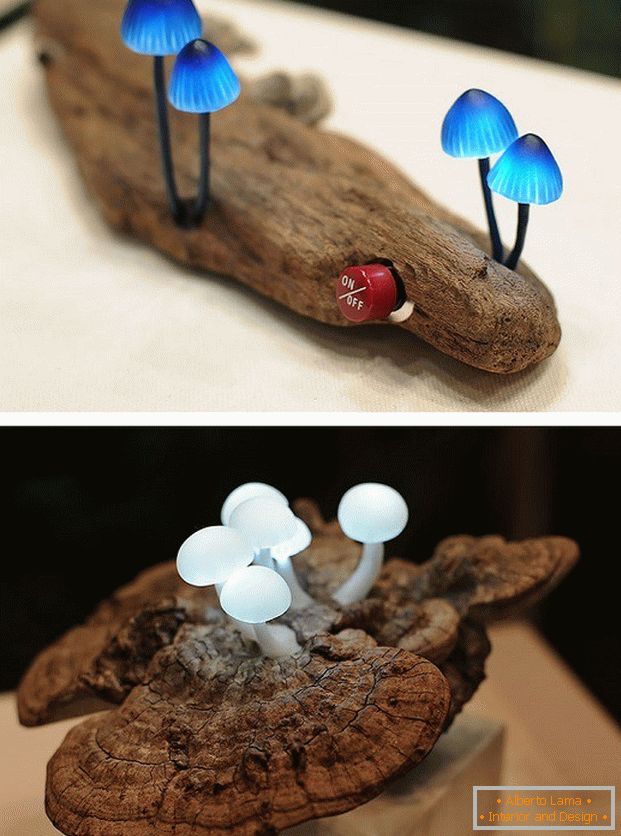 LED-Lampe in Form von Pilzen auf einem Stück Holz