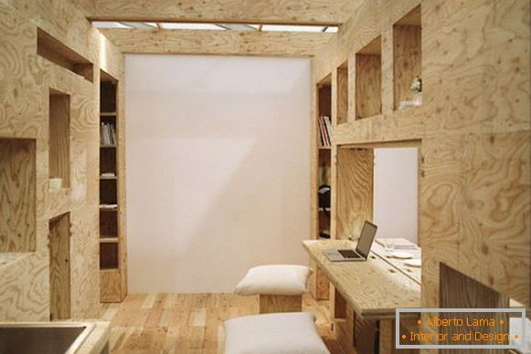 Büro-Wohnung mit transformierbaren Möbeln