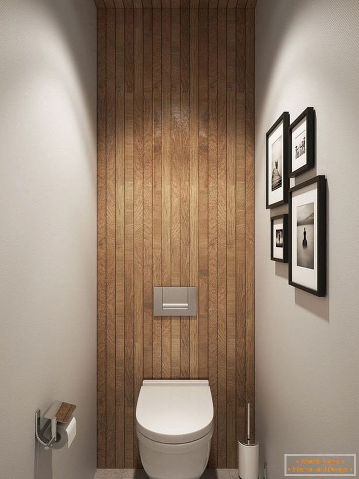 Ein Badezimmer mit einer Holzdecke und einer Wand