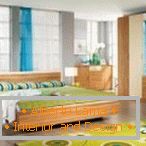 Grün- und Gelbtöne im Design des Schlafzimmers