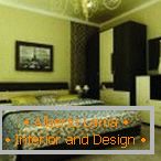 Eleganter Schlafzimmerinnenraum in den grünen und braunen Tönen