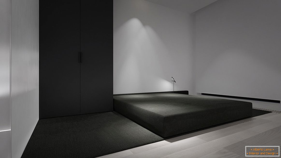 Ein Schlafzimmer im Stil des Minimalismus ist das hellste Beispiel für ein Designmerkmal. Das Hauptmerkmal ist ein Minimum an Möbeln.