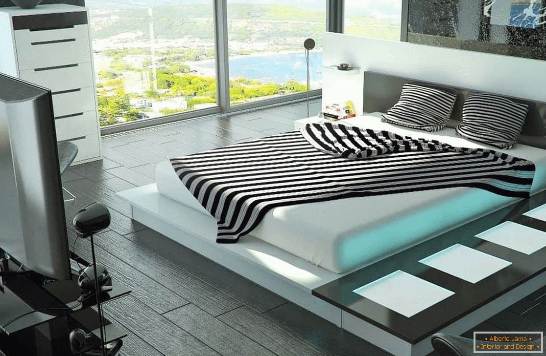 Schlafzimmer mit einem großen Bett mit High-Tech-Beleuchtung