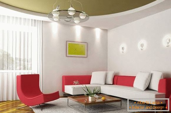 Grüne Spanndecke im Design des Wohnzimmers in einem modernen Stil