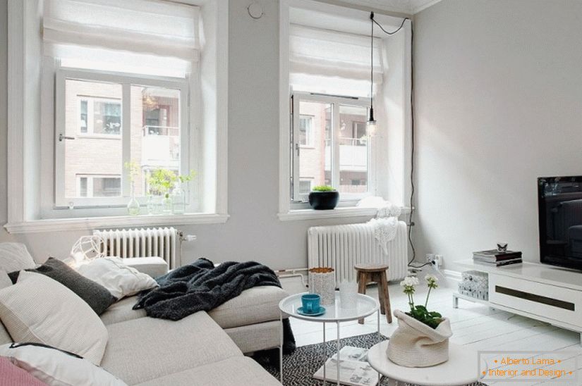 Das Wohnzimmer des Studio-Apartments im skandinavischen Stil