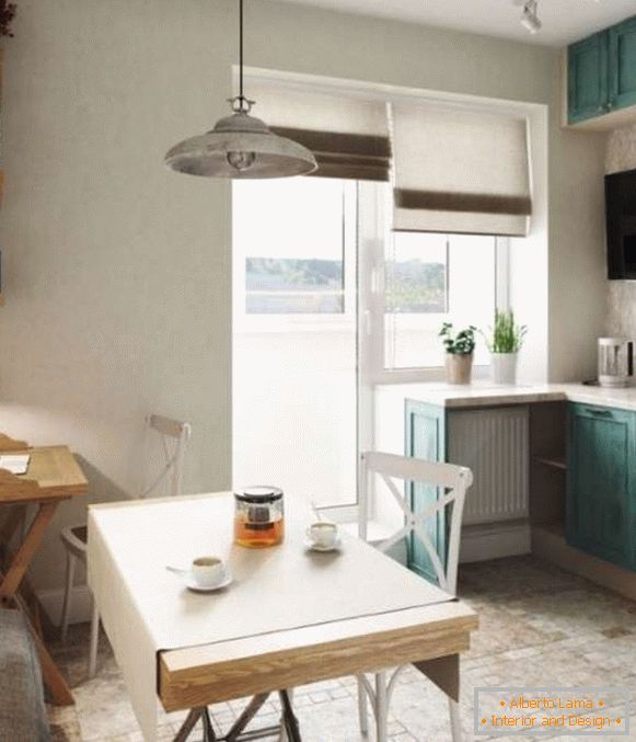 Küchendesign mit Balkon in einer kleinen Studiowohnung - Foto
