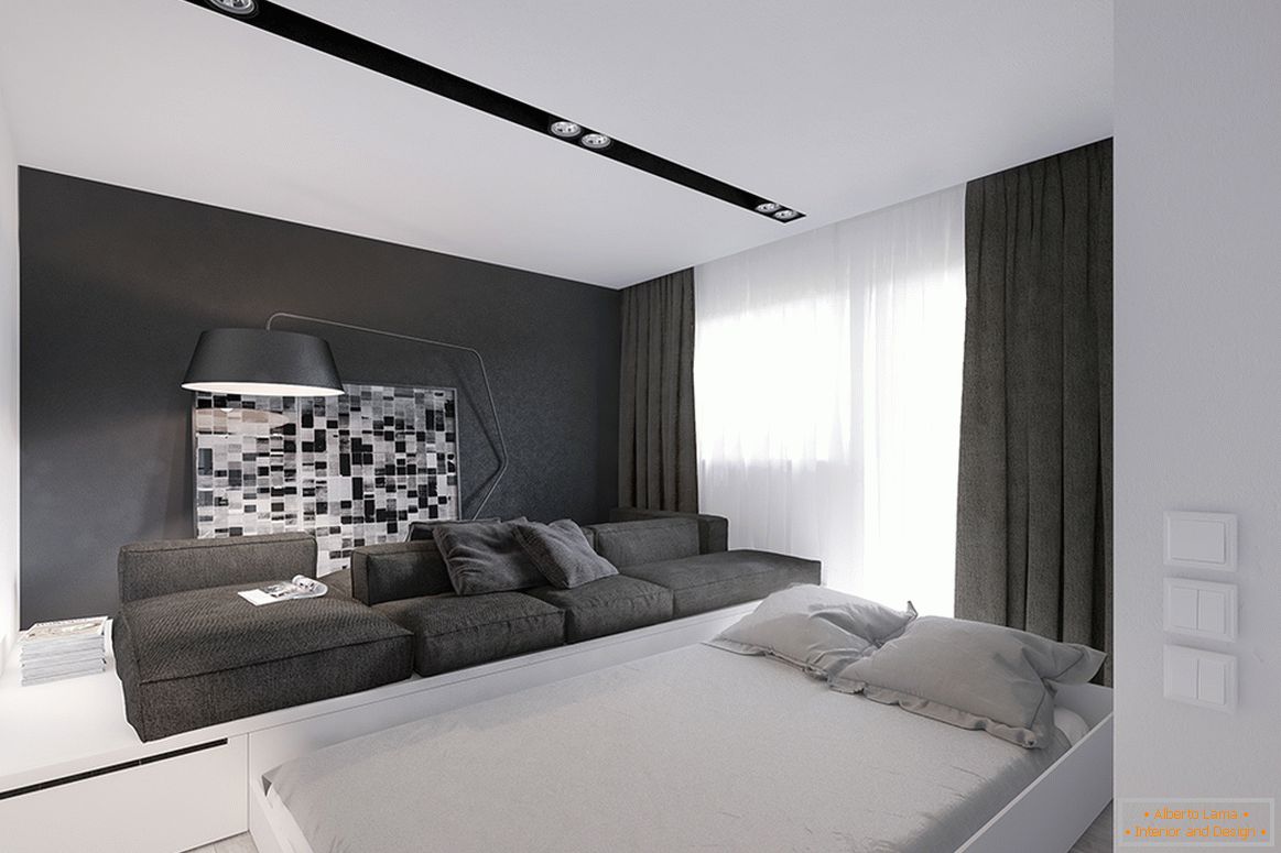 Ein ausziehbares Bett im Wohnzimmer einer kleinen Wohnung