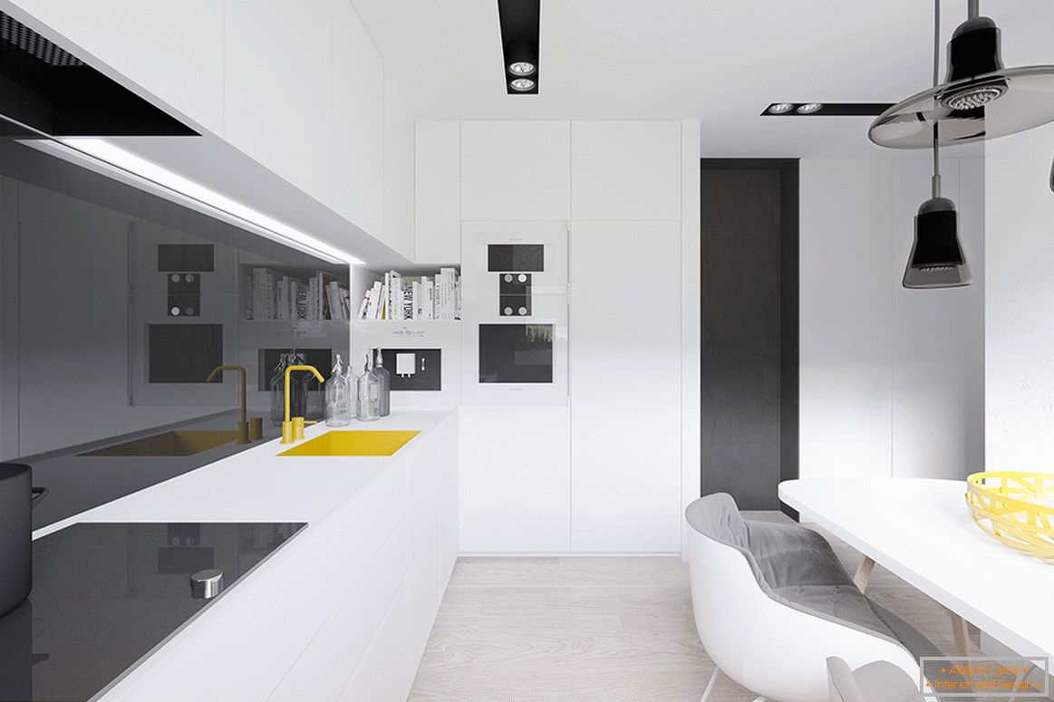 Gelbe Akzente im Inneren der Schwarz-Weiß-Küche