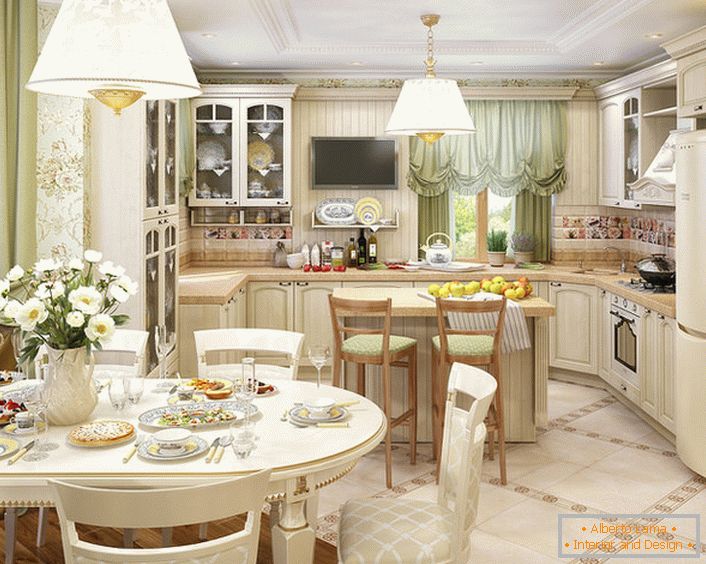 Die Küche, im Stil des ländlichen Landes organisiert, ist mit dem Wohnzimmer kombiniert. Die richtige Anordnung von Licht und dekorativen Akzenten macht den Raum attraktiv und raffiniert.