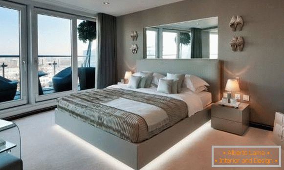 Design eines Schlafzimmers mit einem Bett mit LED-Beleuchtung