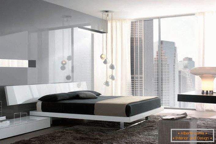 Glänzende Oberflächen mit einem metallischen Glanz machen das Hi-Tech-Schlafzimmer geräumiger und leichter.